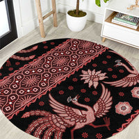 Round batik carpet, black with red bird-and-floral motifs, circular rug