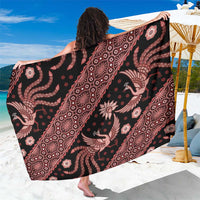 Black batik sarong with red and pink elephant and medallion pattern, wide drape