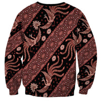 Unisex crewneck sweatshirt back with red and black batik motifs, long sleeves