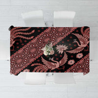 Red batik tablecloth with dark base, intricate bird and floral pattern, rectangular