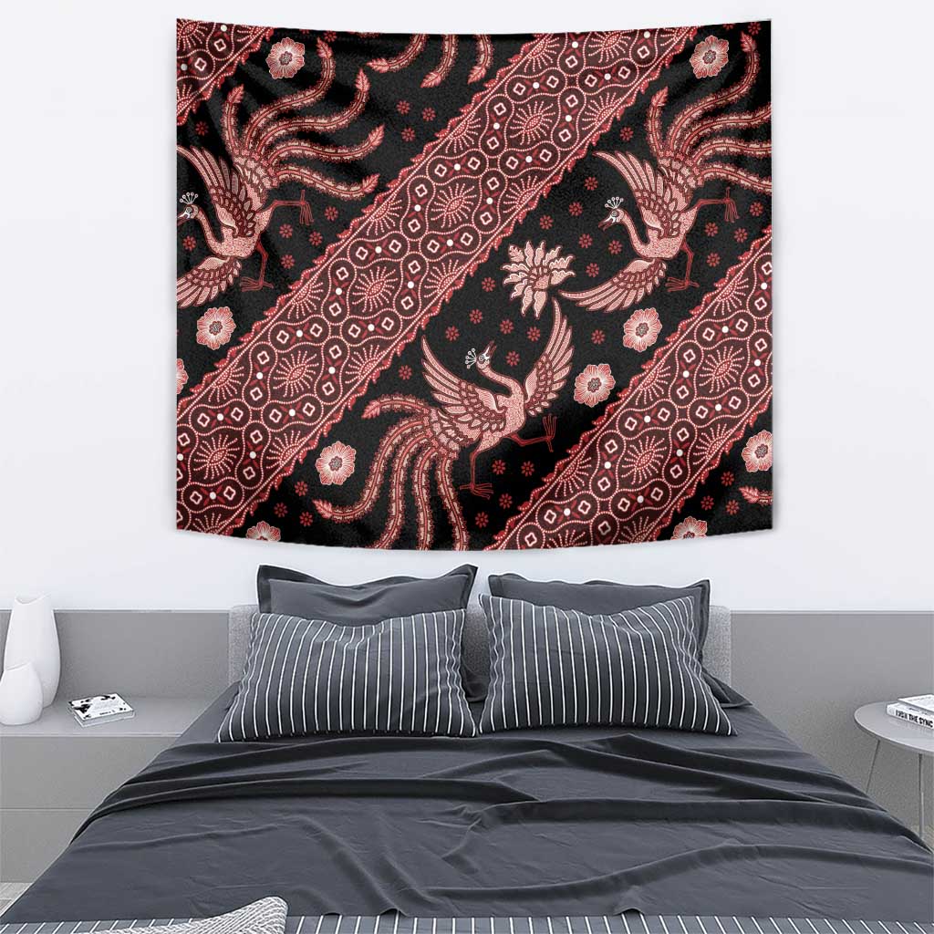Indonesia batik tapestry close-up with dark background and red floral bird motif, wall hanging