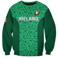 Green unisex sweatshirt with patterned shamrock and 'IRELAND' front graphic