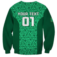 Green unisex sweatshirt back with shamrock pattern and 'YOUR TEXT' lettering graphic