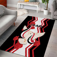Black area rug with centered dove graphic, red roses, red-white striped zigzag lines