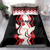 Black bedding set with white dove and red-striped flag graphic on duvet and pillows