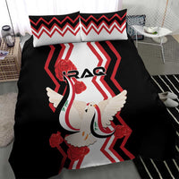 Black bedding set with dove carrying flag graphic, red chevron accents on pillows