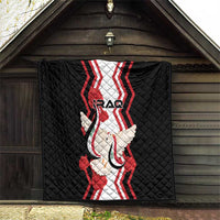 Black quilt hanging on a porch, featuring “IRAQ” center text with dove carrying flag