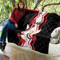Black quilt with red-and-white vertical stripes, dove carrying flag, and “IRAQ” graphic
