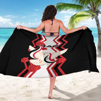 Black sarong spread wide, Iraq dove emblem with red roses and chevron stripes