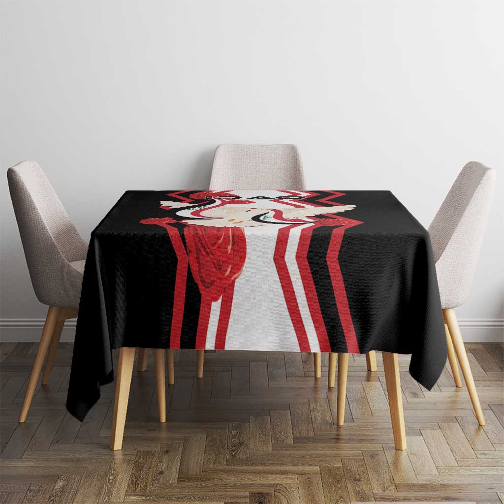 Black tablecloth with dove and flag graphic print, draped over table corners