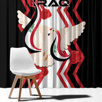 Close-up of black curtain fabric with Iraqi flag dove and red rose graphic.
