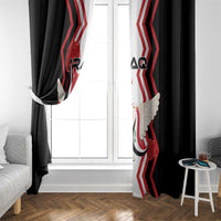 Black curtains framing a window, with Iraqi flag center panel and dove wing print.