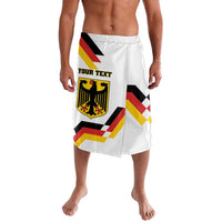 White lavalava-style sarong with Germany flag stripes and eagle emblem; "Your Text" print