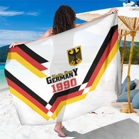 White sarong with Unity Day 1990 emblem and bold flag stripe graphic print