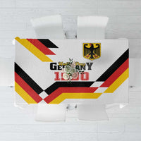 White tablecloth with bold black, red, and yellow Germany Unity Day 1990 graphic