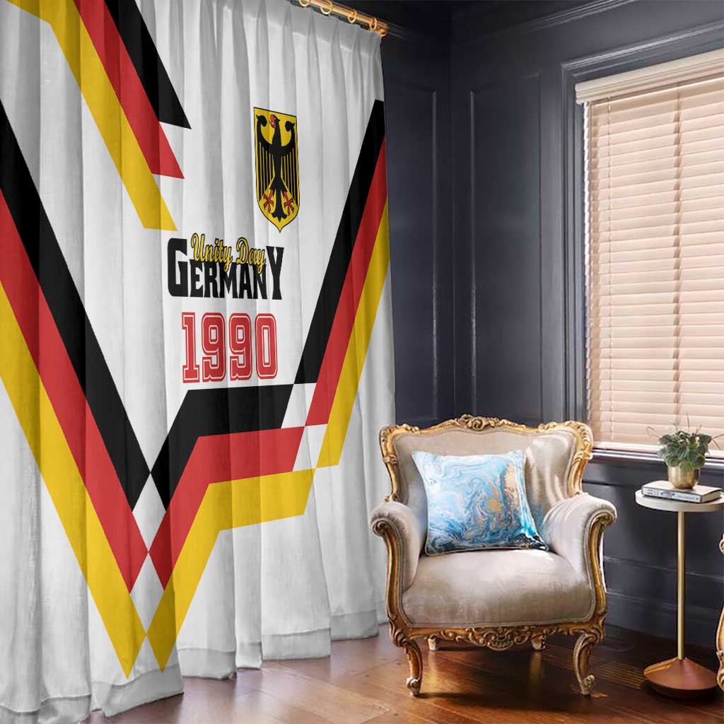 White hanging curtain with Germany Unity Day 1990 text, crest, and red yellow black chevron stripes.