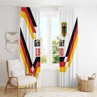 White curtain with Germany Unity Day 1990 print and red yellow black diagonal stripe chevrons.
