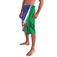 Lavalava-style wrap skirt, side view, green/blue panel with crest print