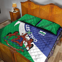Lesotho quilt bed set with green, blue, white design and 'LESOTHO 1966' crest