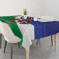 Lesotho flag-style tablecloth with green, blue, and emblem panel along the table edge