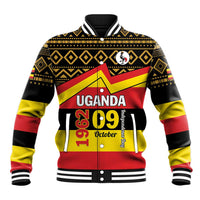 Black baseball jacket with Uganda emblem, yellow/red graphic, ribbed varsity collar and cuffs.