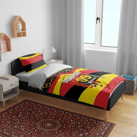 Uganda flag-themed bedding set on bed with matching duvet and pillows featuring “UGANDA 09 October”