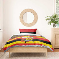 Uganda flag-themed duvet cover with bold stripes and “UGANDA 09 October” design on bed
