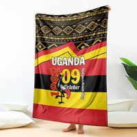 Uganda Independence Day blanket with geometric border and large 'UGANDA 09 October'