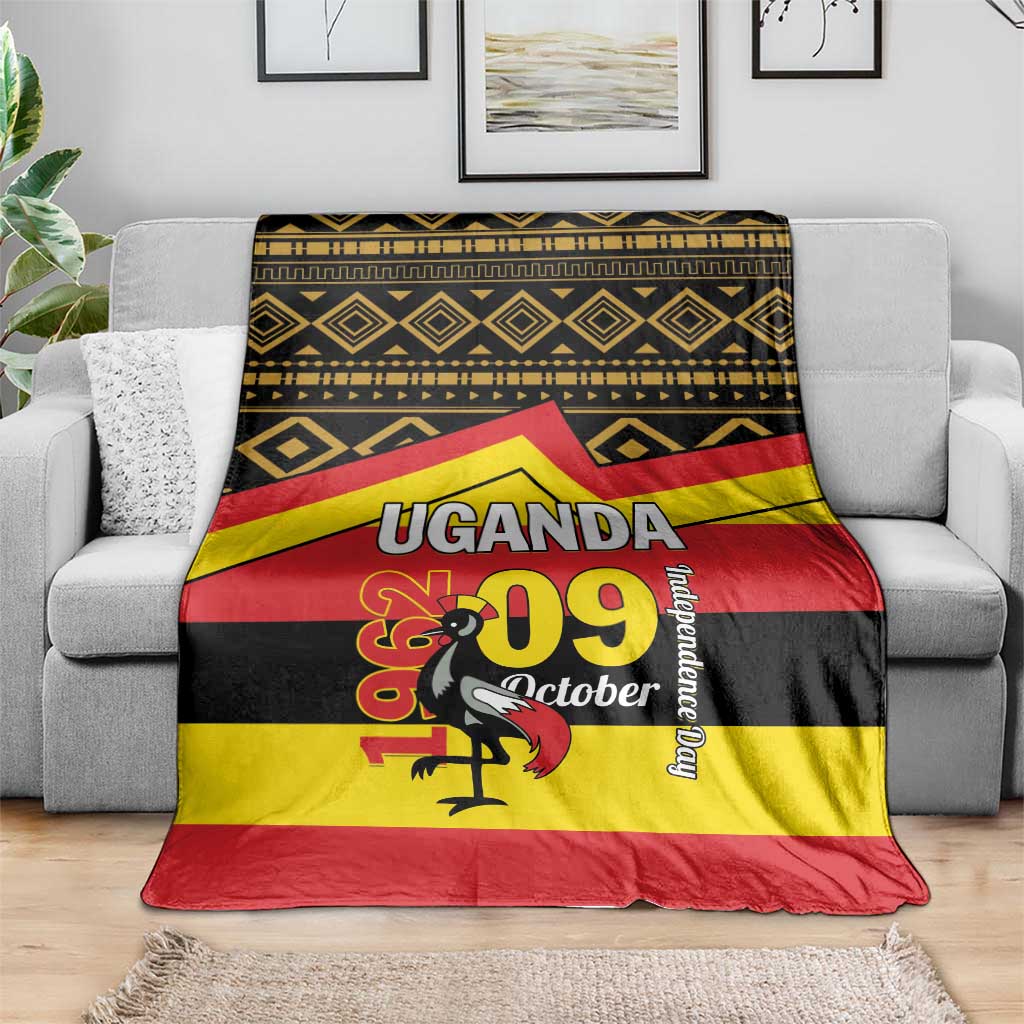 Uganda Independence Day blanket draped on sofa with Uganda flag stripe design