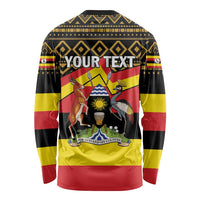 Long sleeve shirt with African geometric pattern, black/yellow/red, "YOUR TEXT" graphic