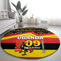 Round Uganda 1969 October graphic carpet in red, yellow, black African pattern