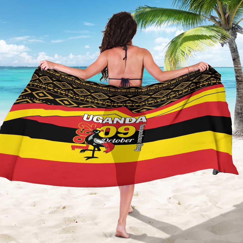 Black sarong with red and yellow stripes, featuring 'UGANDA 09 October' graphic