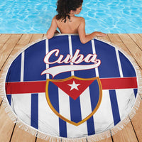 Round Cuba beach blanket with shield emblem, red star, and tassel-edged border