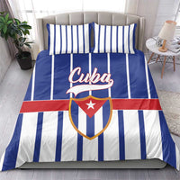 Blue striped Cuba bedding set with crest emblem across the duvet front