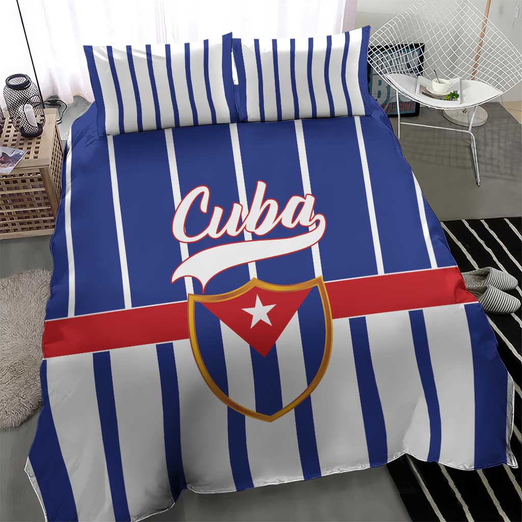 Blue striped bedding set with Cuba crest logo on duvet and coordinated pillowcases