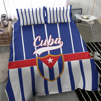 Blue striped bedding set with Cuba crest logo on duvet and coordinated pillowcases
