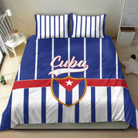 Blue striped Cuba bedding set with matching pillowcases and central crest graphic