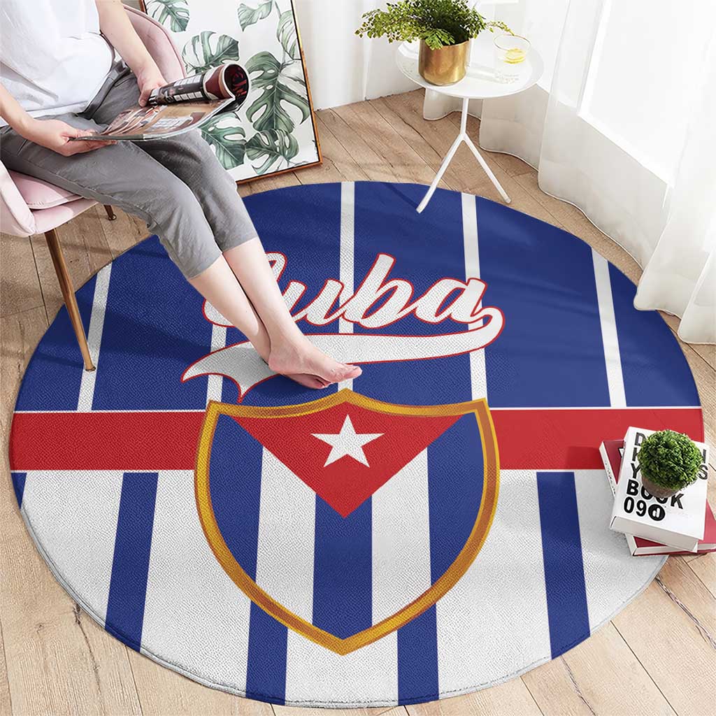 Blue round rug featuring bold Cuba logo crest over red, white, and gold stripes