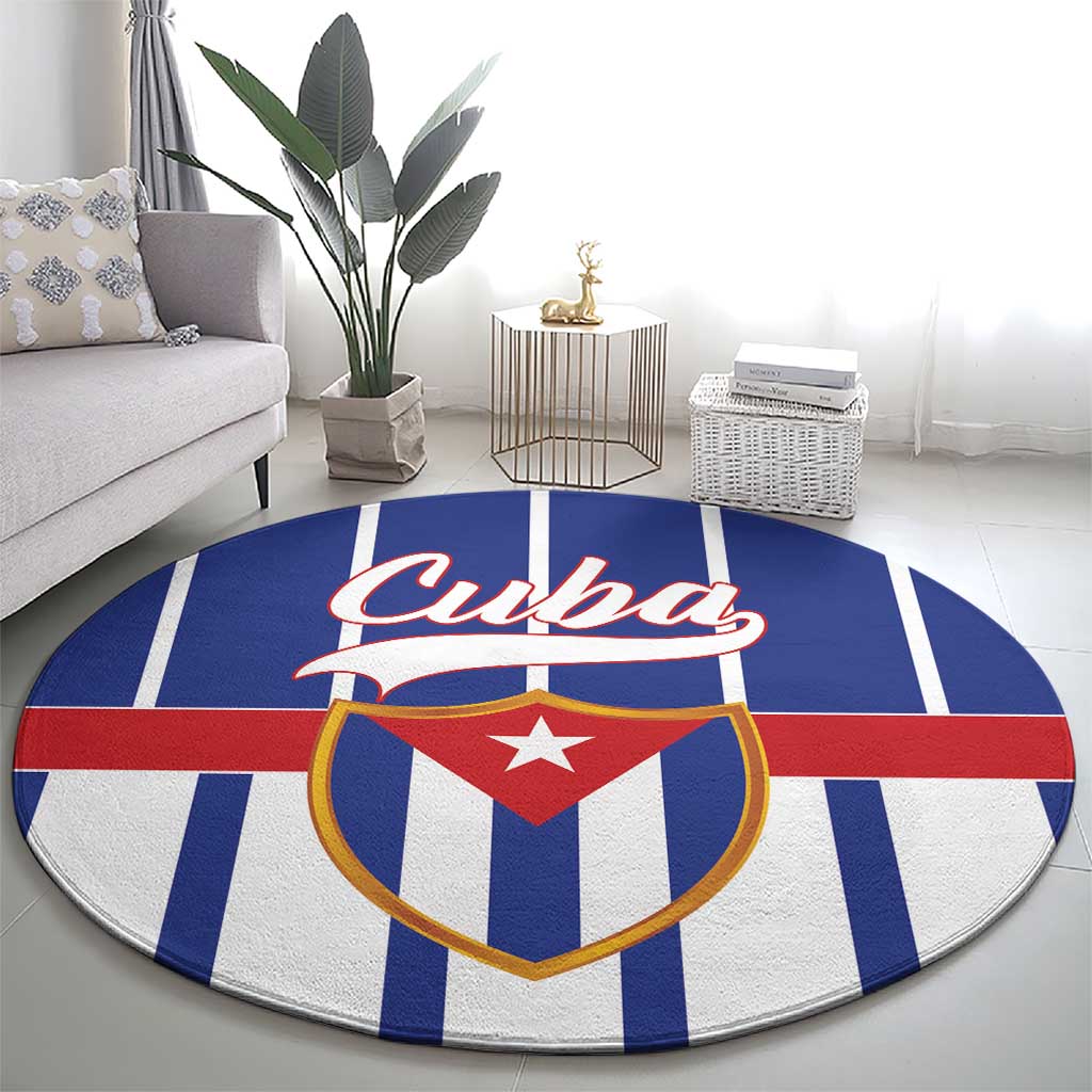 Blue round rug with large Cuba wordmark and shield crest on red, white, and blue stripes