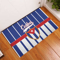 Blue rubber doormat with Cuba crest, red stripe band, and white vertical stripes