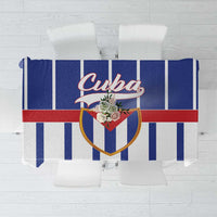 Blue and white striped tablecloth with Cuba crest and red accents at center