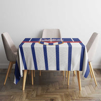 Round tablecloth with blue and white vertical stripes and a centered emblem