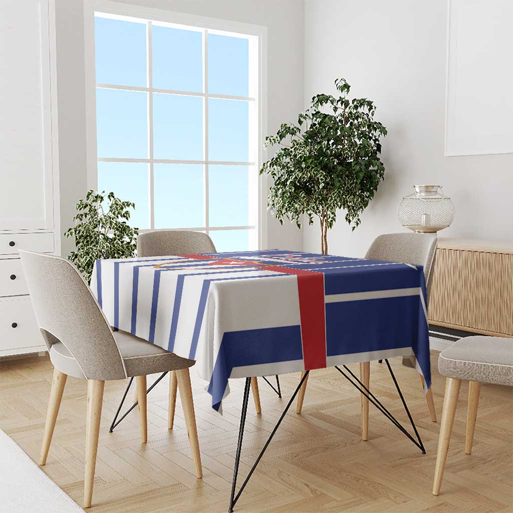 Blue and white striped tablecloth draped over a dining table