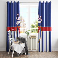 Blue striped window curtains with Cuba shield graphics, front view