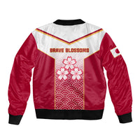 Red and white bomber jacket back with ribbed collar and 'Brave Blossoms' cherry blossom panel