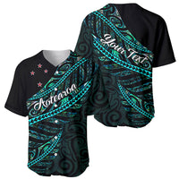 Black baseball jersey with teal Polynesian pattern and white Aotearoa script