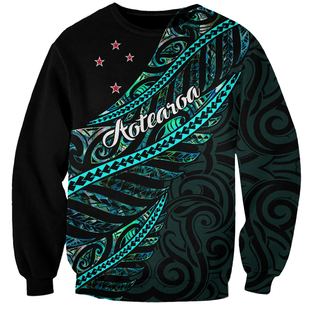 Personalized Aotearoa sweatshirt, black with teal Polynesian pattern and red star accents
