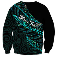 Personalized Aotearoa sweatshirt, black with large teal Polynesian print on back