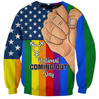 Unisex sweatshirt with rainbow stripes, stars, fist graphic, and 'National Coming Out Day' text