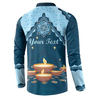 Blue button sweatshirt with back print reading "Your Text" and diya candle design